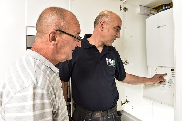 A BASI engineer carrying out a new boiler installation