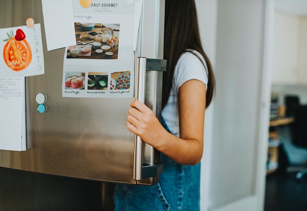 An open fridge packed with food